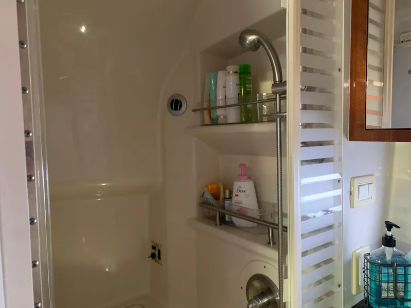 Slide: The Image of Interior view of a 2012 Sea Ray Sundancer 370 yacht shower. - 38