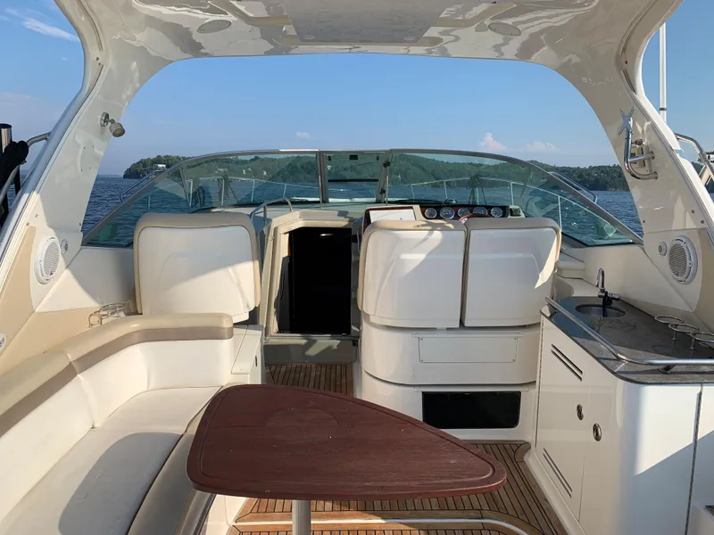 Slide: The Image of Interior of a 2012 Sea Ray Sundancer 370 yacht on the water. - 44