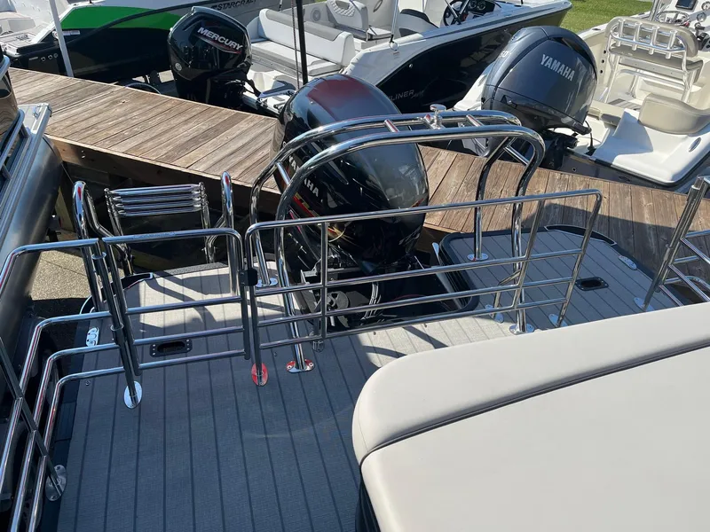 Slide: The Image of 2024 Starcraft SLS 3 Q DH boat with Yamaha and Mercury outboard motors. - 5