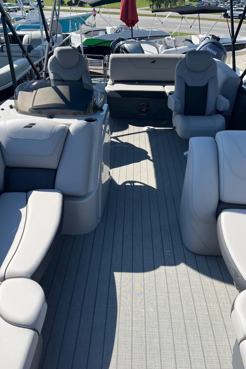 Slide: The Image of 2024 Starcraft SLS 3 Q DH boat interior with luxurious seating. - 9