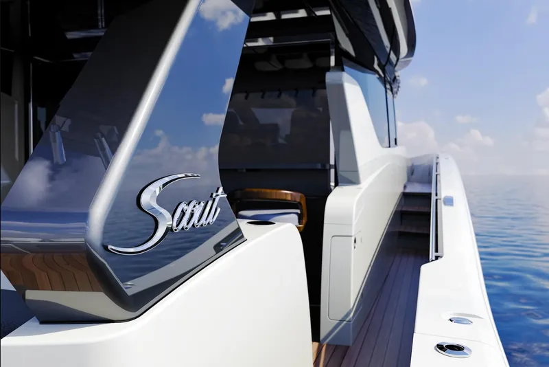 Slide: The Image of 2025 Scout 67 LX yacht with sleek design on calm ocean waters. - 3