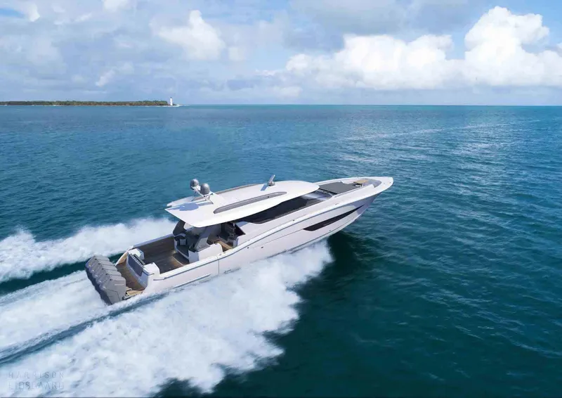 Slide: The Image of 2025 Scout 67 LX luxury yacht cruising on open water. - 5