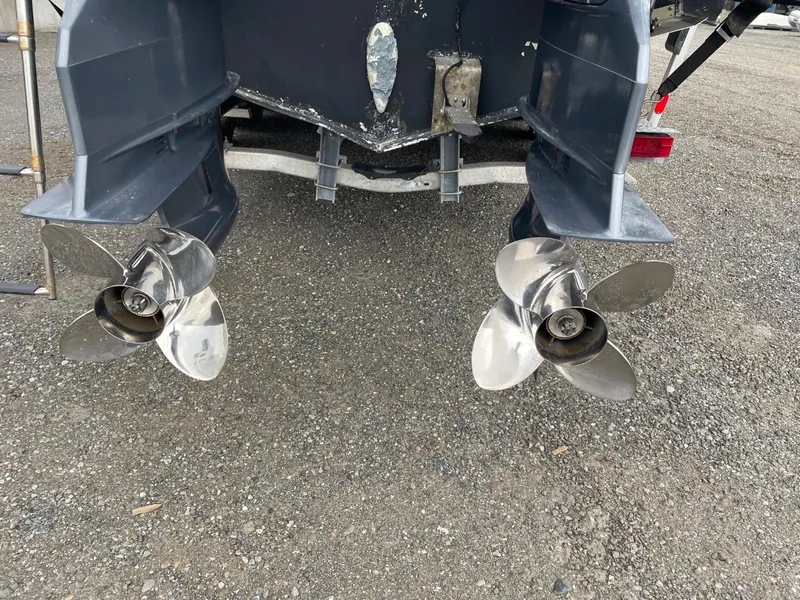 Slide: The Image of Twin propellers of a 2010 Glacier Craft Custom Aluminum boat. - 10