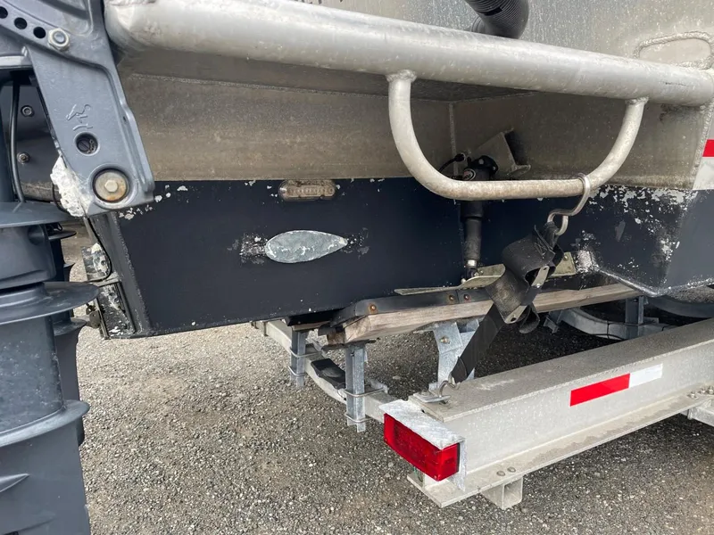 Slide: The Image of Close-up of a 2010 Glacier Craft Custom Aluminum boat on a trailer. - 13