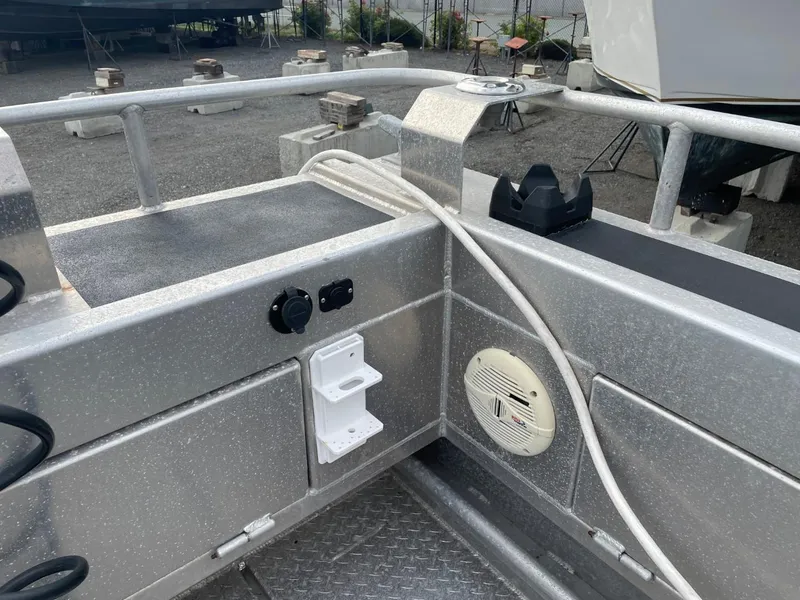 Slide: The Image of 2010 Glacier Craft Custom Aluminum boat interior with control panel and speaker. - 21