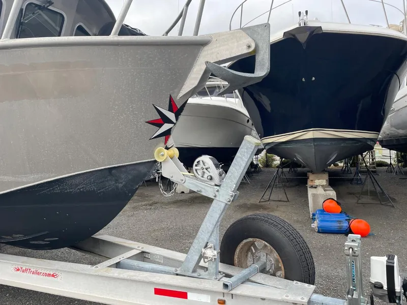 Slide: The Image of 2010 Glacier Craft Custom Aluminum boat on trailer in a boatyard. - 3