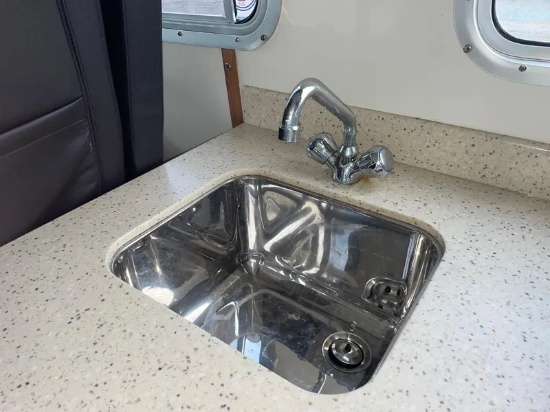 Slide: The Image of Stainless steel sink and faucet in 2010 Glacier Craft Custom Aluminum boat. - 34
