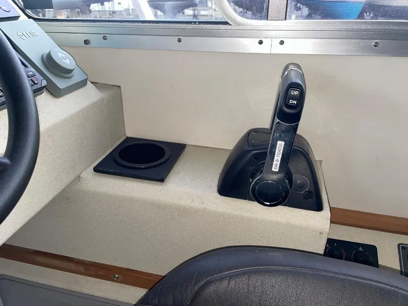 Slide: The Image of 2010 Glacier Craft Custom Aluminum boat control panel with throttle lever and cup holder. - 41
