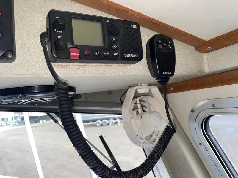 Slide: The Image of Simrad marine radio in 2010 Glacier Craft Custom Aluminum boat cabin. - 47