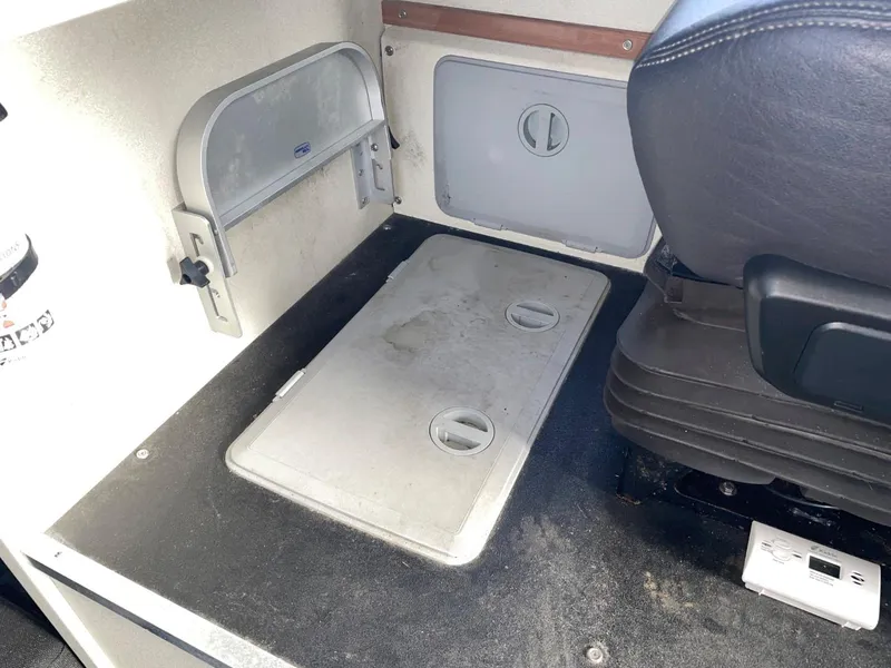 Slide: The Image of 2010 Glacier Craft Custom Aluminum boat interior storage compartments and seating. - 49