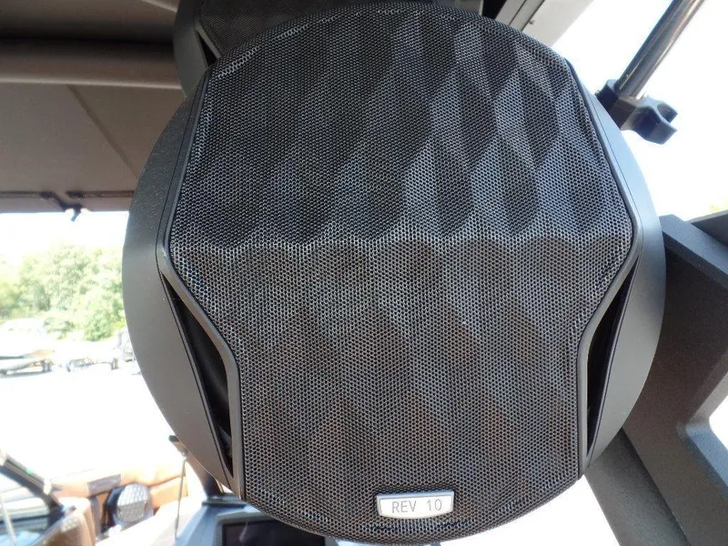 Slide: The Image of Close-up of a Rev 10 speaker on a 2023 Malibu 26 LSV boat. - 15