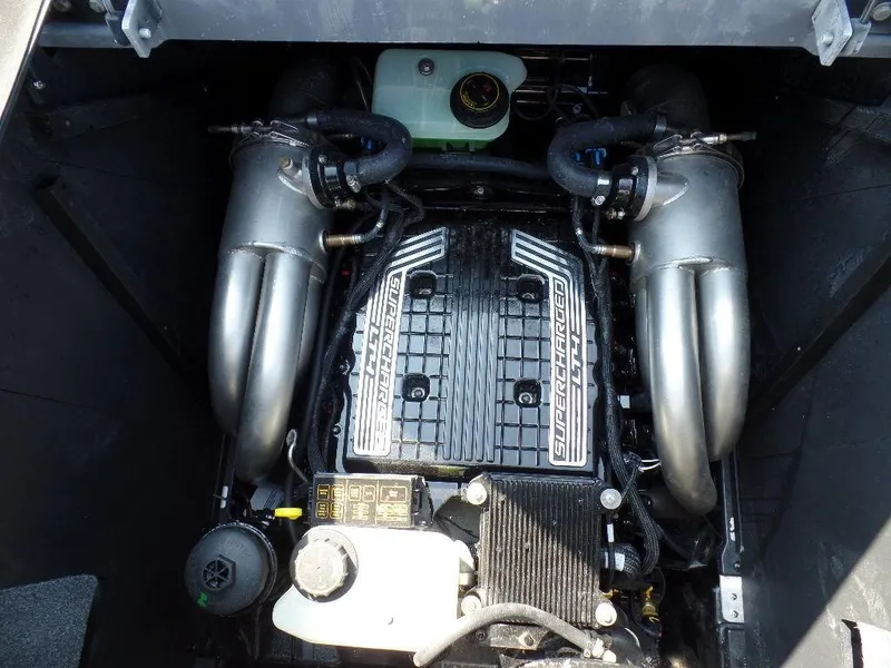 Slide: The Image of 2023 Malibu 26 LSV engine compartment with supercharged engine components. - 17