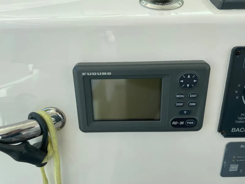 Slide: The Image of Furuno RD-30 display on 2005 Cabo 40 Hardtop Express boat dashboard. - 22