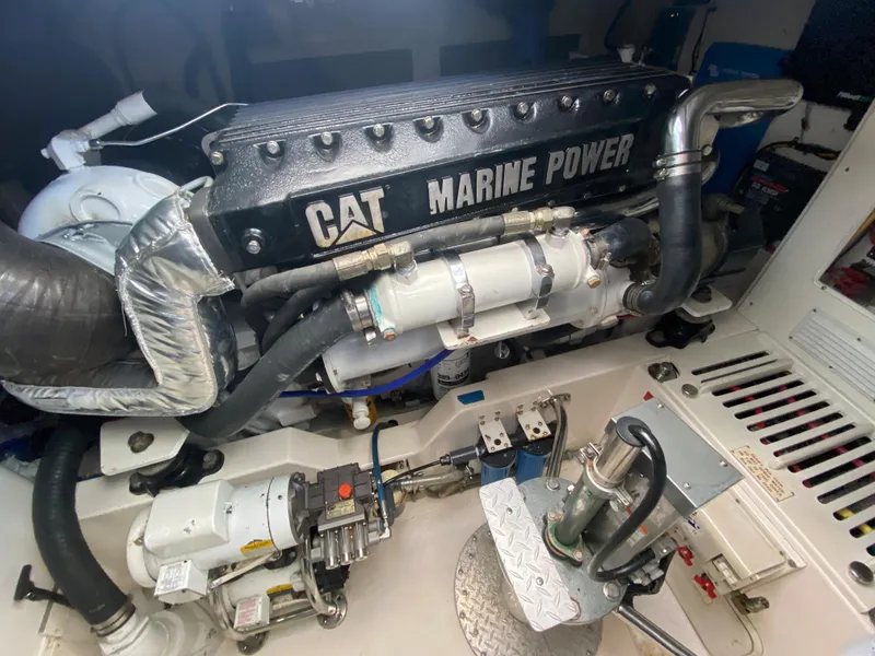 Slide: The Image of Engine room of 2005 Cabo 40 Hardtop Express with CAT Marine Power engine. - 45