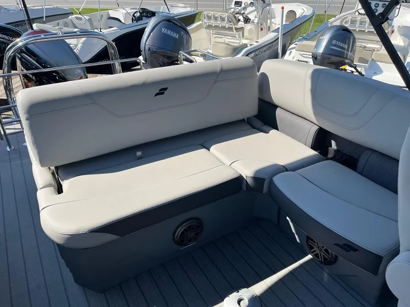 Slide: The Image of 2024 Starcraft SLS 3 Q DH boat with comfortable seating and Yamaha engines. - 6