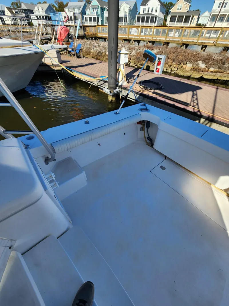 Slide: The Image of 2004 Luhrs 36 Open boat docked at a marina. - 18