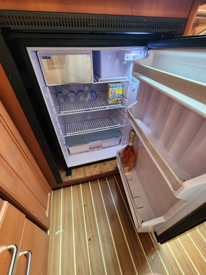 Slide: The Image of 2004 Luhrs 36 Open boat interior with open refrigerator - 39
