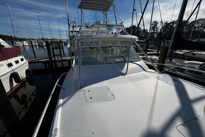 Slide: The Image of LuxPro thermostat on 2004 Luhrs 36 Open boat, displaying time and temperature. - 61