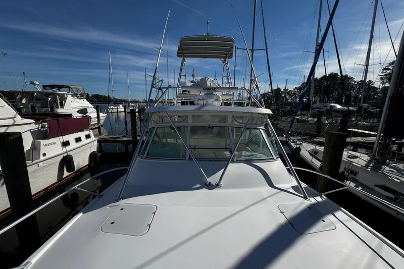 Slide: The Image of Bathroom interior of 2004 Luhrs 36 Open yacht with shower, sink, and toilet. - 62