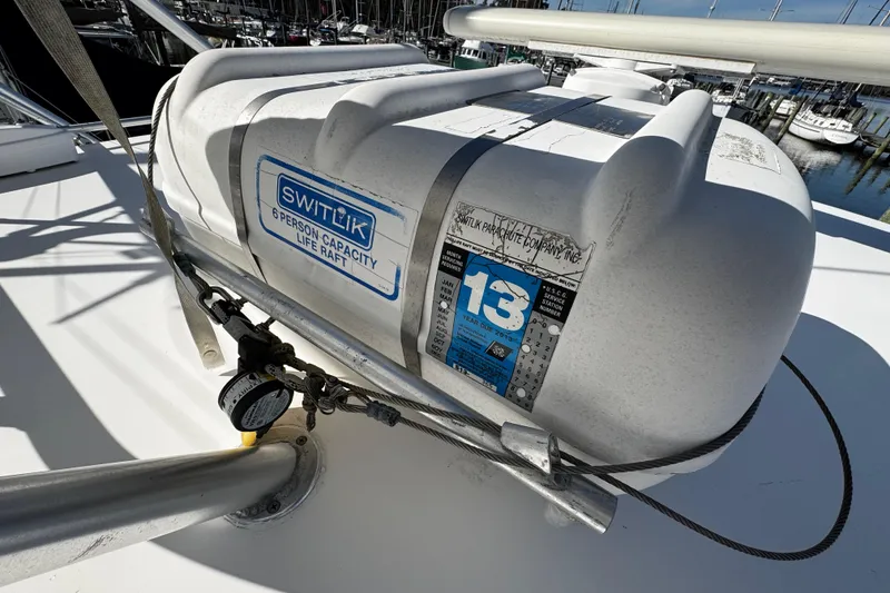 Slide: The Image of 2004 Luhrs 36 Open yacht bathroom with shower, toilet, and sink. - 63