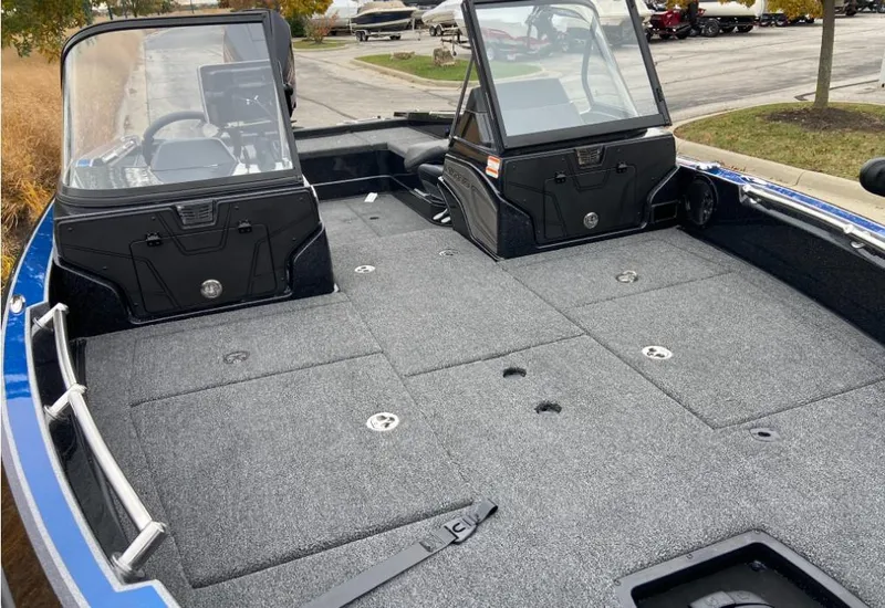 Slide: The Image of 2024 Nitro ZV20 fishing boat with spacious deck and dual consoles. - 4