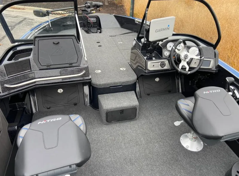 Slide: The Image of 2024 Nitro ZV20 boat interior with Garmin navigation system and dual seats. - 5
