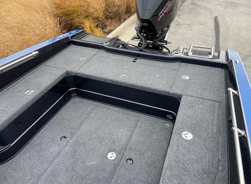 Slide: The Image of 2024 Nitro ZV20 boat deck with motor, spacious and well-designed for fishing. - 7