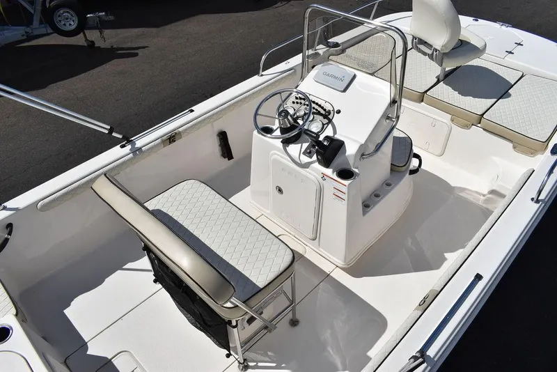 Slide: The Image of 2021 Carolina Skiff 19 LS boat interior with seating and steering console. - 14