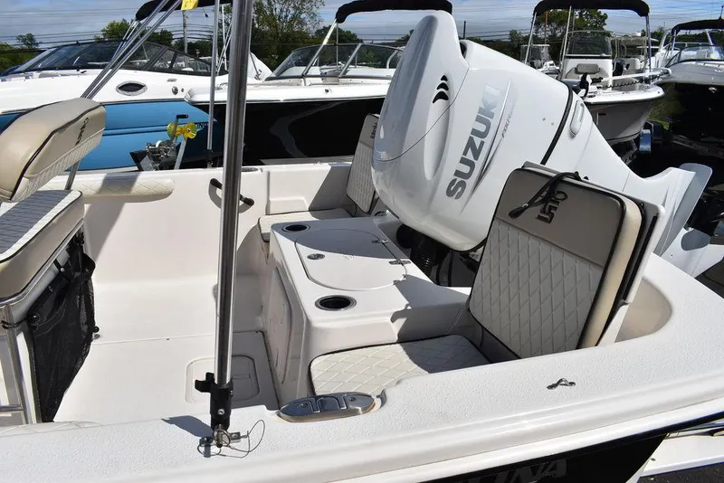 Slide: The Image of 2021 Carolina Skiff 19 LS boat with Suzuki outboard motor, interior seating view. - 15