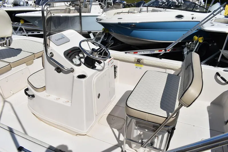 Slide: The Image of 2021 Carolina Skiff 19 LS boat interior with steering console and seating. - 17