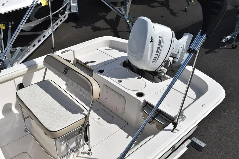 Slide: The Image of 2021 Carolina Skiff 19 LS boat with Suzuki outboard motor and seating. - 21
