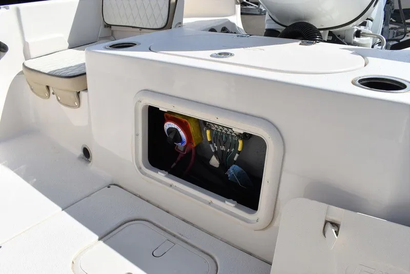 Slide: The Image of 2021 Carolina Skiff 19 LS boat interior with open storage compartment. - 27