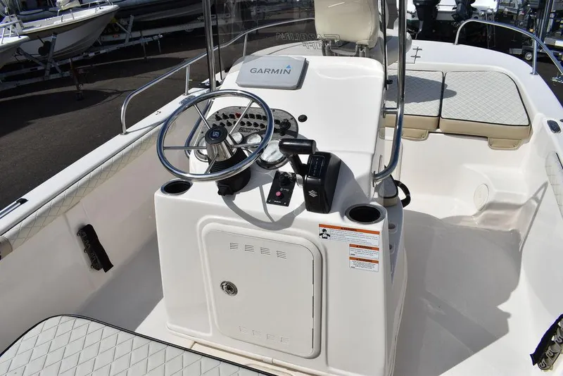 Slide: The Image of 2021 Carolina Skiff 19 LS boat interior with steering console and seating. - 33