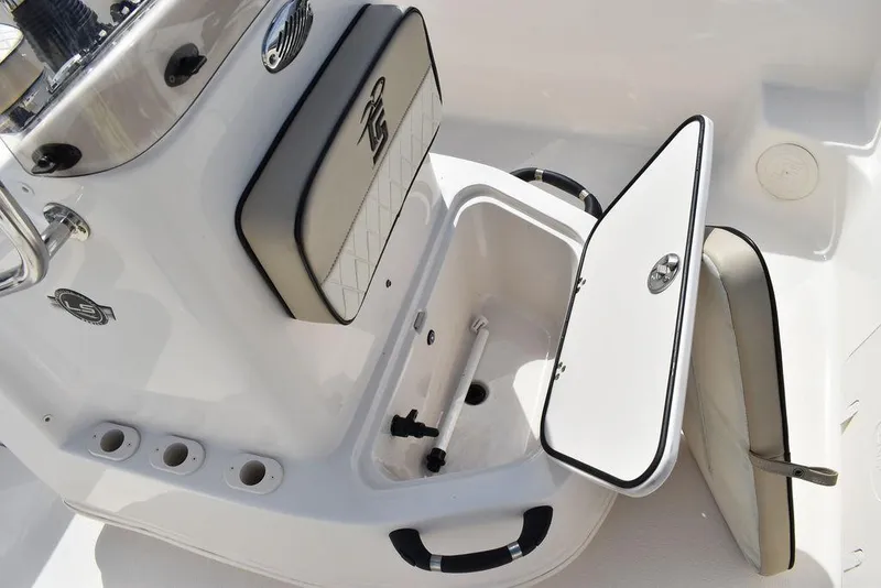 Slide: The Image of 2021 Carolina Skiff 19 LS boat interior with open storage compartment and seating. - 39