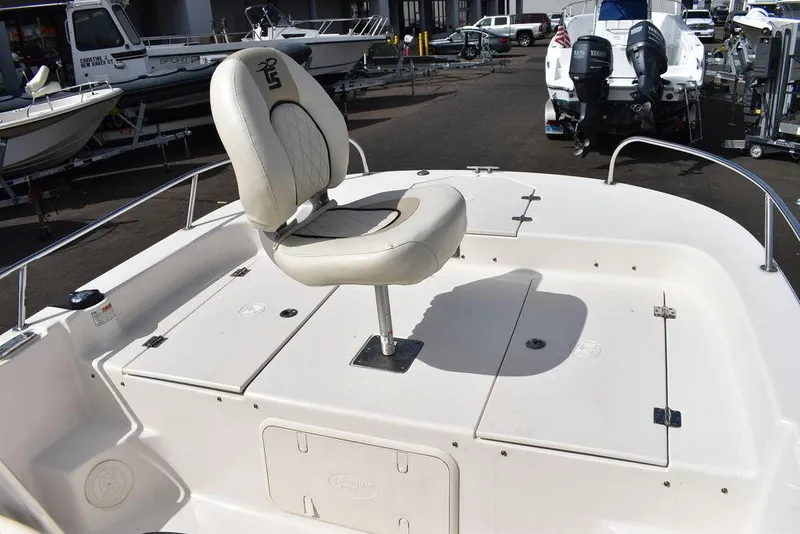 Slide: The Image of 2021 Carolina Skiff 19 LS boat deck with swivel seat and storage compartments. - 41