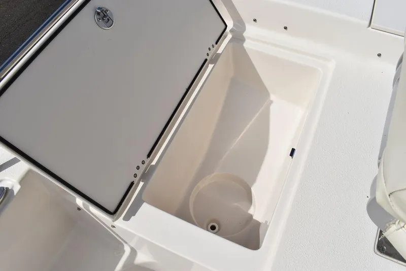 Slide: The Image of 2021 Carolina Skiff 19 LS boat storage compartment, open and empty. - 45