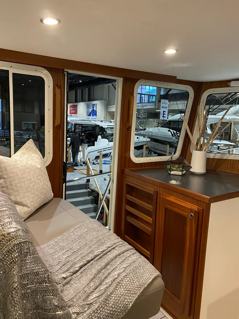 Slide: The Image of Interior of 2025 American Tug 362 yacht at a boat show. - 24