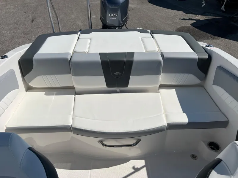 Slide: The Image of 2024 Chaparral 19 SSi boat with white and gray seating. - 13