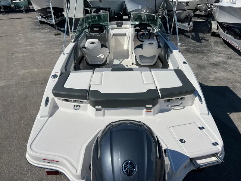 Slide: The Image of 2024 Chaparral 19 SSi boat with spacious seating and modern design. - 3