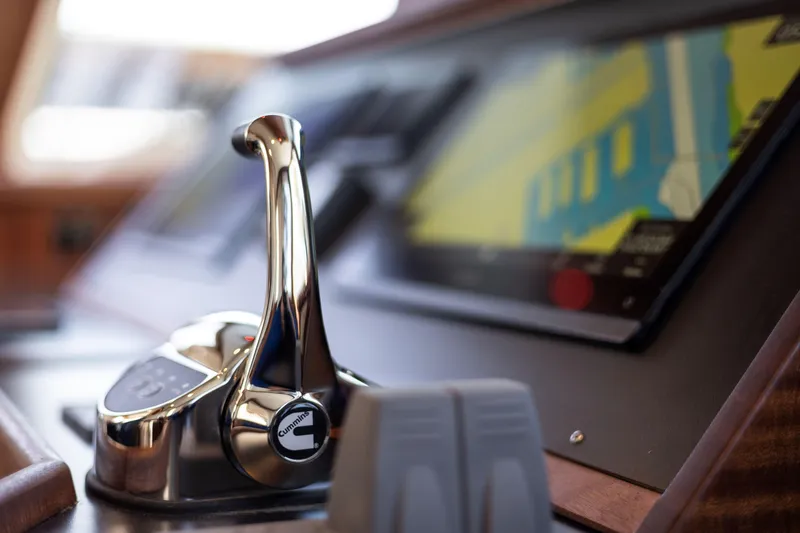 Slide: The Image of Control panel of 2026 American Tug 435 with navigation display and throttle lever. - 15