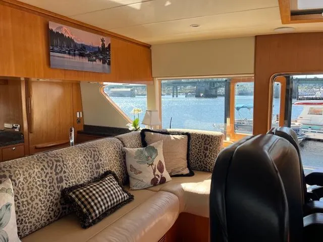 Slide: The Image of Luxurious interior of 2007 Regency Yachts 670 Pilothouse with waterfront view. - 15