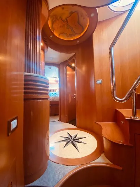 Slide: The Image of Luxurious interior of 2007 Regency Yachts 670 Pilothouse with elegant wood finishes. - 17