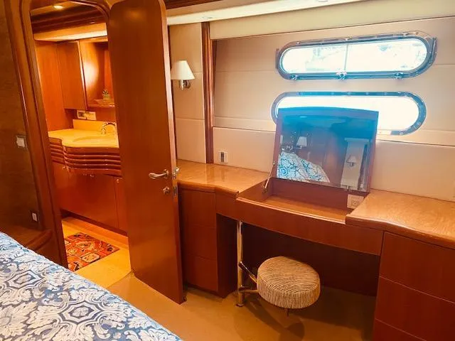 Slide: The Image of Luxurious interior of 2007 Regency Yachts 670 Pilothouse with vanity and ensuite bathroom. - 24