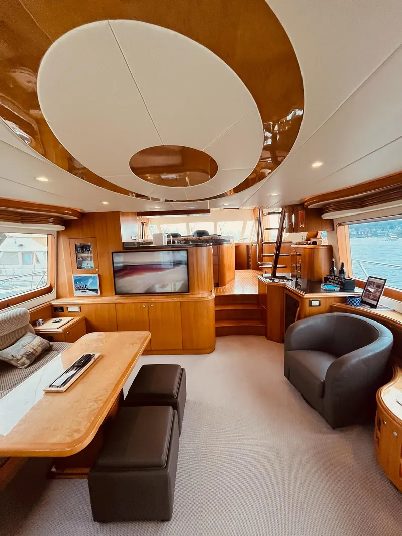 Slide: The Image of Luxurious interior of 2007 Regency Yachts 670 Pilothouse with elegant wood finishes. - 35