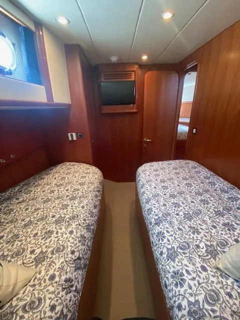 Slide: The Image of Twin bed cabin in 2007 Regency Yachts 670 Pilothouse. - 36
