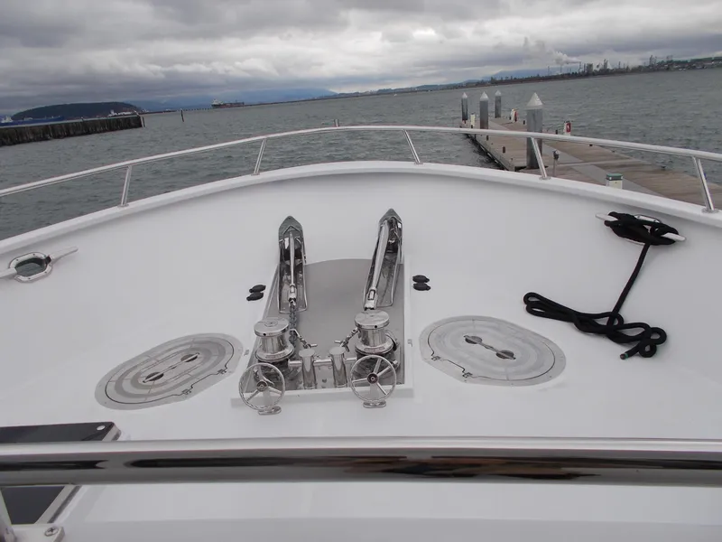 Slide: The Image of Bow view of 2017 Northern Marine Expedition yacht at dock, overcast sky. - 18