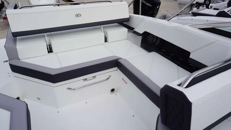 Slide: The Image of 2024 Cobalt R4 boat interior with white and gray seating. - 3