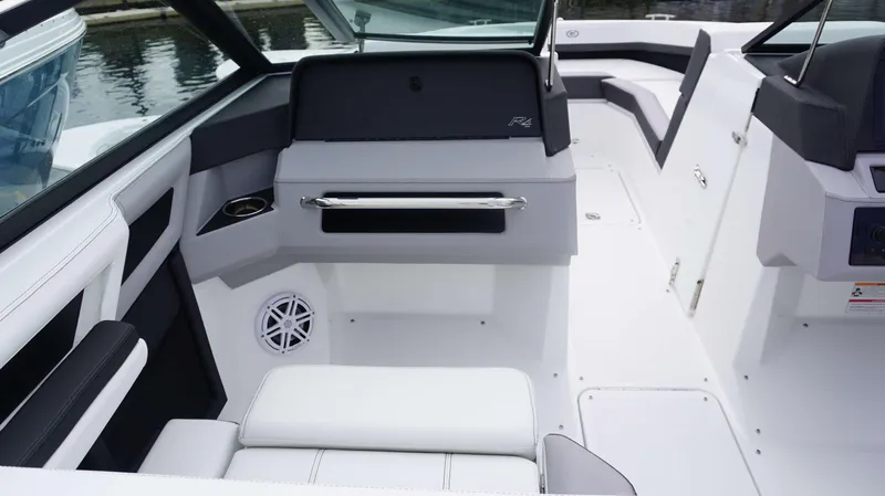Slide: The Image of 2024 Cobalt R4 boat interior with modern seating and sleek design. - 5