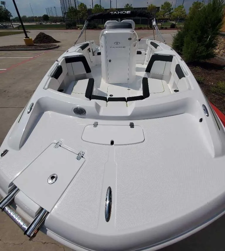 Slide: The Image of 2024 Tahoe 2150 CC boat with spacious seating and modern design. - 3