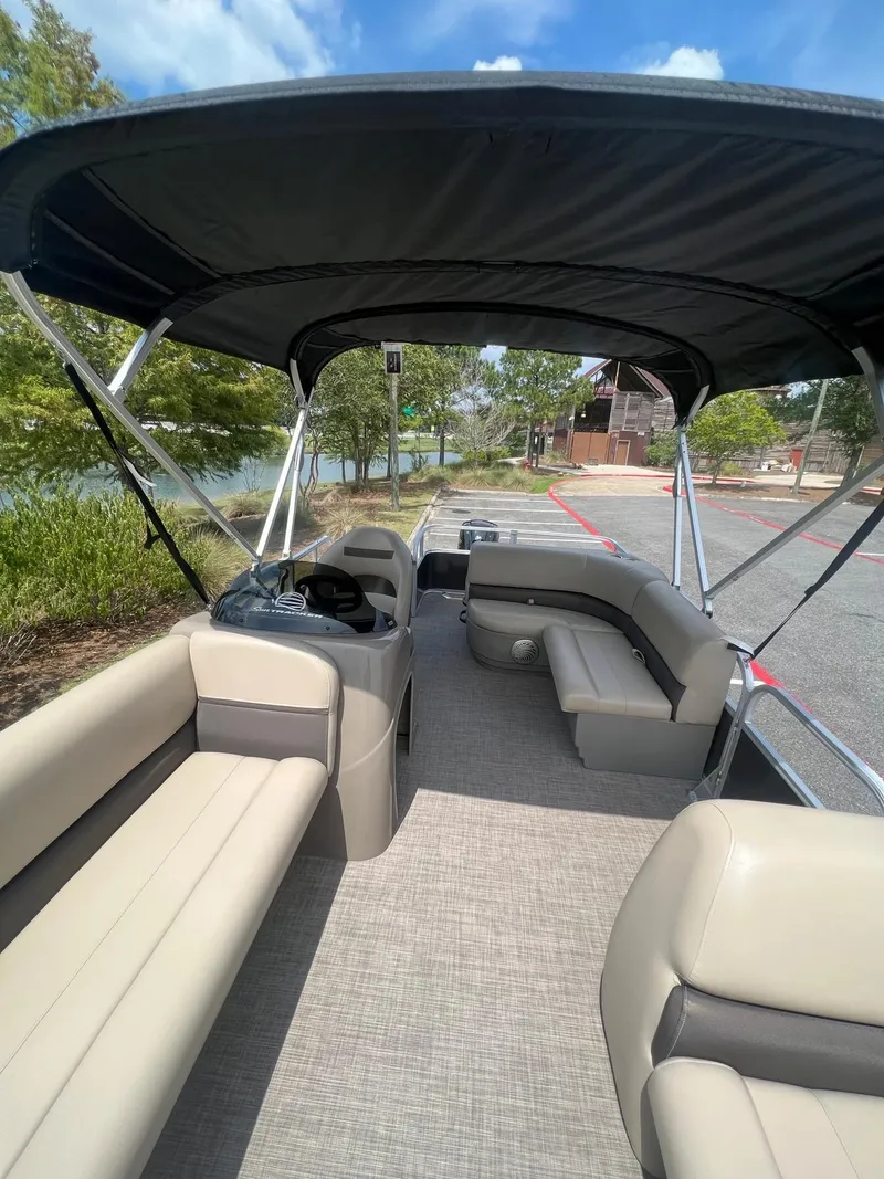 Slide: The Image of 2024 Sun Tracker Party Barge 18 DLX pontoon boat with spacious seating and canopy. - 13